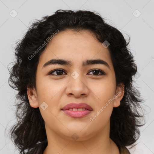 Joyful latino young-adult female with medium  brown hair and brown eyes