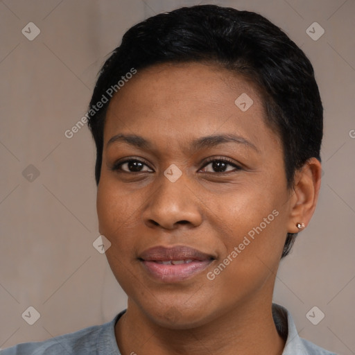 Joyful black adult female with short  black hair and brown eyes