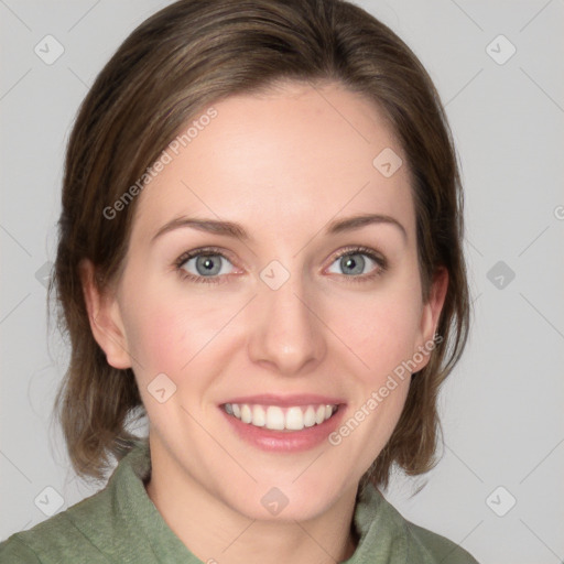 Joyful white young-adult female with medium  brown hair and green eyes