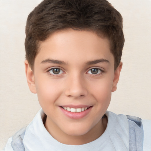 Joyful white child female with short  brown hair and brown eyes