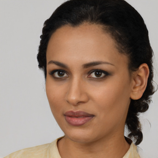 Neutral latino young-adult female with medium  black hair and brown eyes