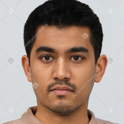 Neutral latino young-adult male with short  black hair and brown eyes