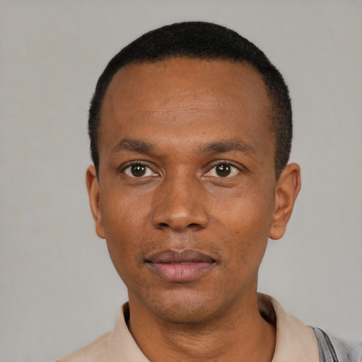 Neutral black young-adult male with short  black hair and brown eyes