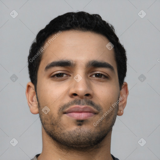 Neutral latino young-adult male with short  black hair and brown eyes