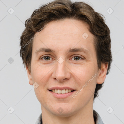 Joyful white adult female with short  brown hair and brown eyes