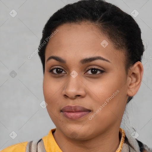 Joyful latino young-adult female with short  brown hair and brown eyes