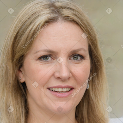 Joyful white adult female with medium  brown hair and blue eyes