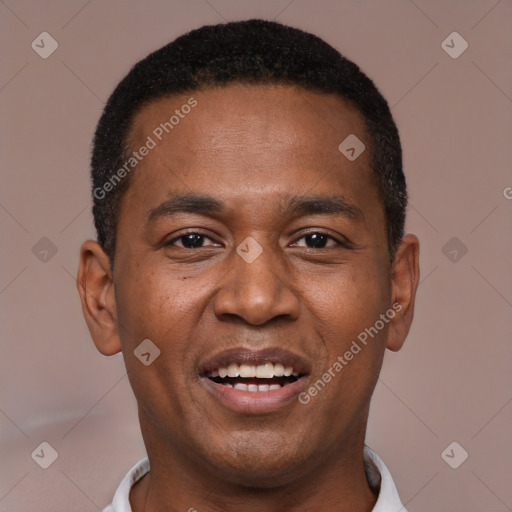 Joyful black young-adult male with short  black hair and brown eyes