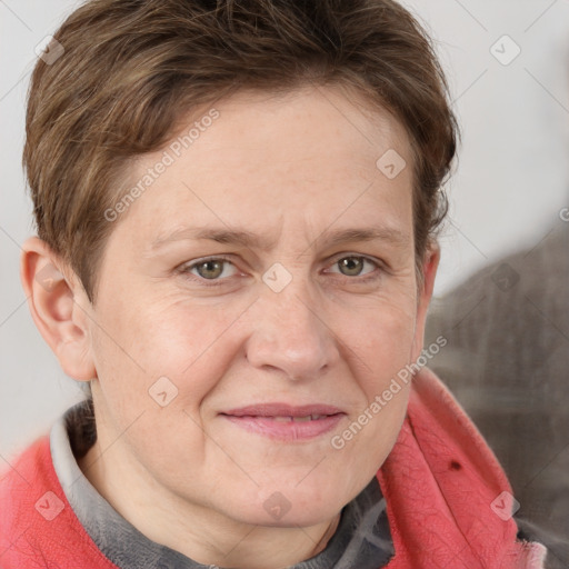 Joyful white adult female with short  brown hair and grey eyes