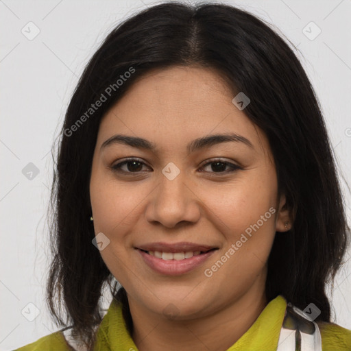 Joyful latino young-adult female with medium  brown hair and brown eyes