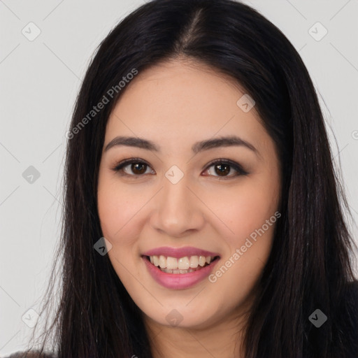 Joyful latino young-adult female with long  brown hair and brown eyes