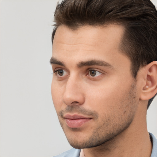 Neutral white young-adult male with short  brown hair and brown eyes