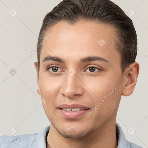 Joyful white young-adult male with short  brown hair and brown eyes