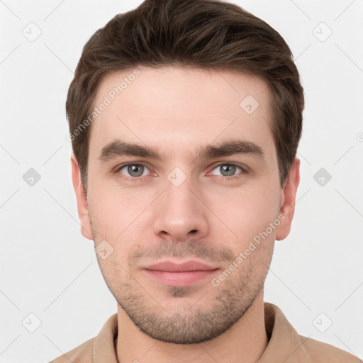 Neutral white young-adult male with short  brown hair and brown eyes