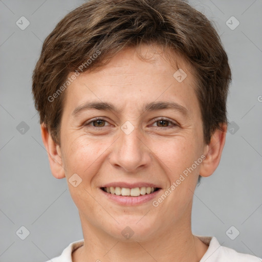 Joyful white adult female with short  brown hair and brown eyes