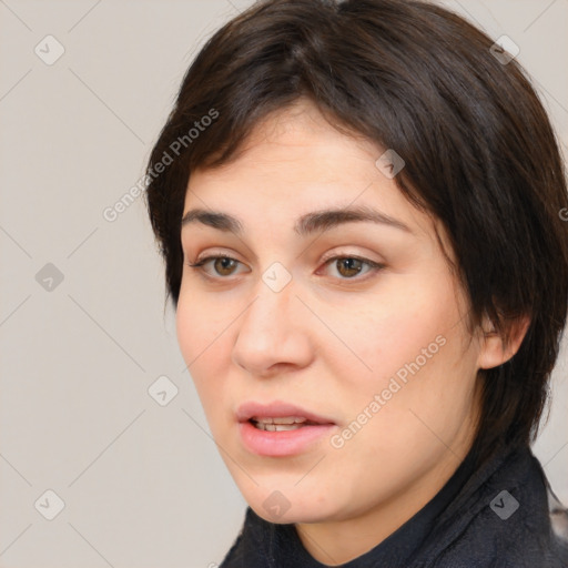 Neutral white young-adult female with medium  brown hair and brown eyes