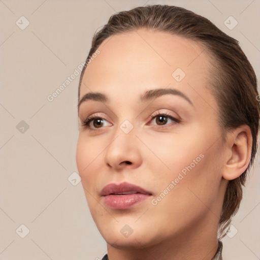 Neutral white young-adult female with medium  brown hair and brown eyes