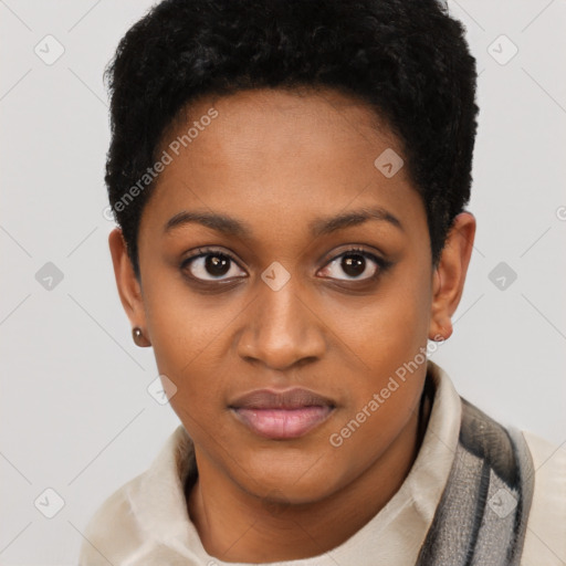 Joyful black young-adult female with short  brown hair and brown eyes