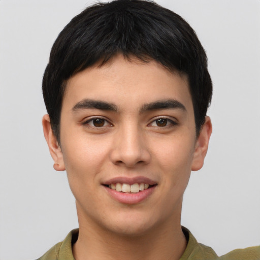 Joyful asian young-adult male with short  brown hair and brown eyes