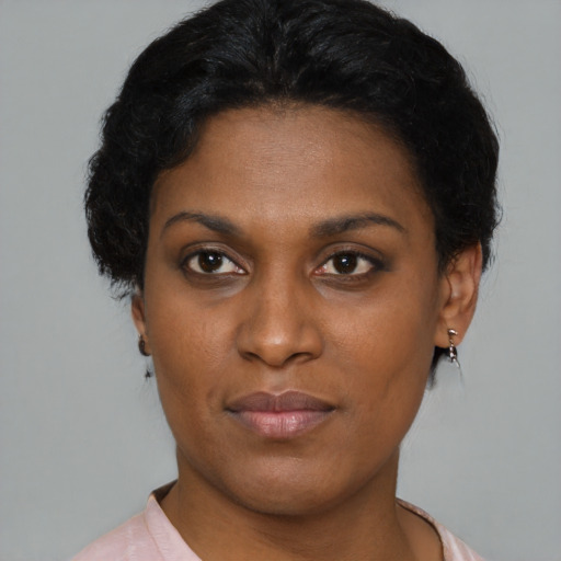 Neutral black young-adult female with short  brown hair and brown eyes