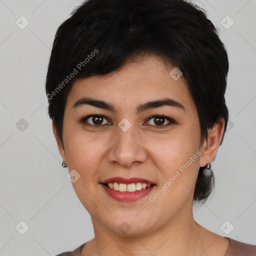 Joyful latino young-adult female with short  black hair and brown eyes