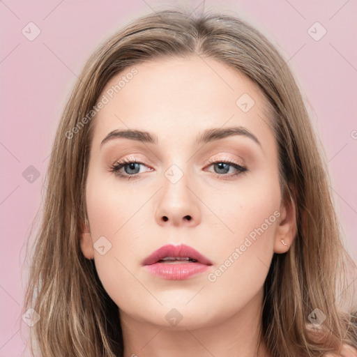 Neutral white young-adult female with long  brown hair and brown eyes