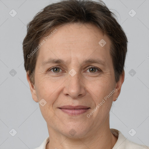 Joyful white adult female with short  brown hair and brown eyes