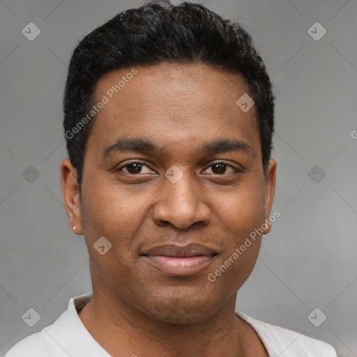 Joyful latino young-adult male with short  black hair and brown eyes