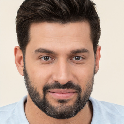 Joyful white young-adult male with short  brown hair and brown eyes