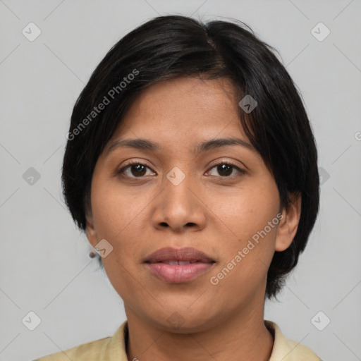 Joyful asian young-adult female with medium  brown hair and brown eyes