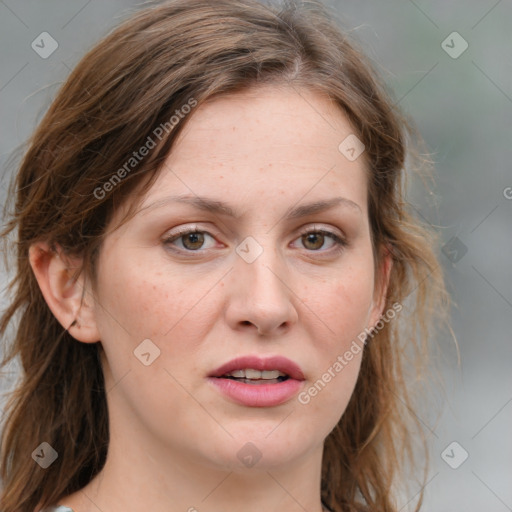 Joyful white young-adult female with medium  brown hair and blue eyes