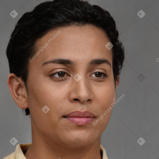 Joyful latino young-adult female with short  brown hair and brown eyes