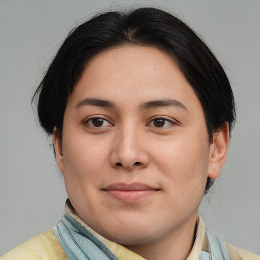 Joyful asian young-adult female with short  brown hair and brown eyes