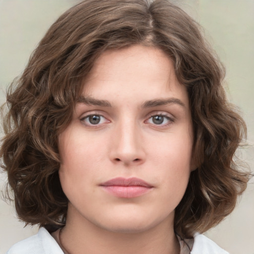 Neutral white young-adult female with medium  brown hair and green eyes