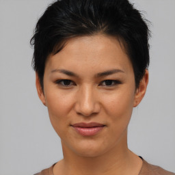 Joyful asian young-adult female with short  brown hair and brown eyes