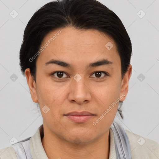 Joyful asian young-adult female with short  brown hair and brown eyes