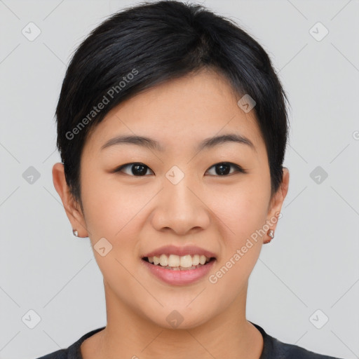 Joyful asian young-adult female with short  black hair and brown eyes