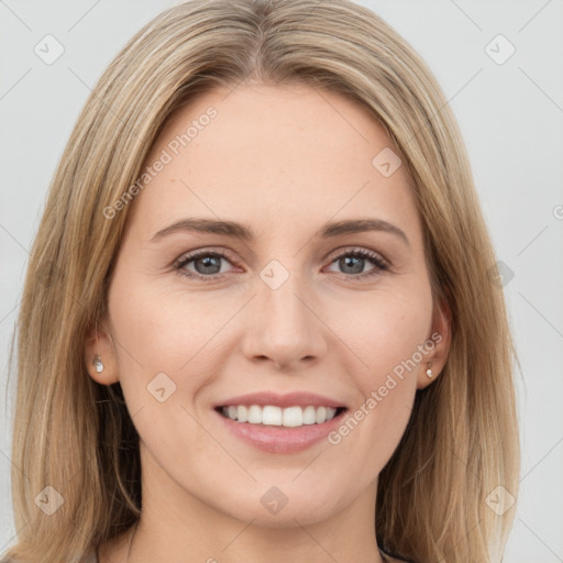 Joyful white young-adult female with long  brown hair and green eyes