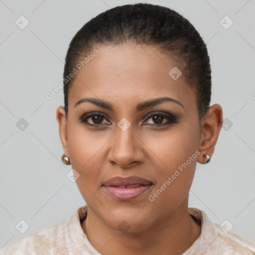 Joyful black young-adult female with short  brown hair and brown eyes