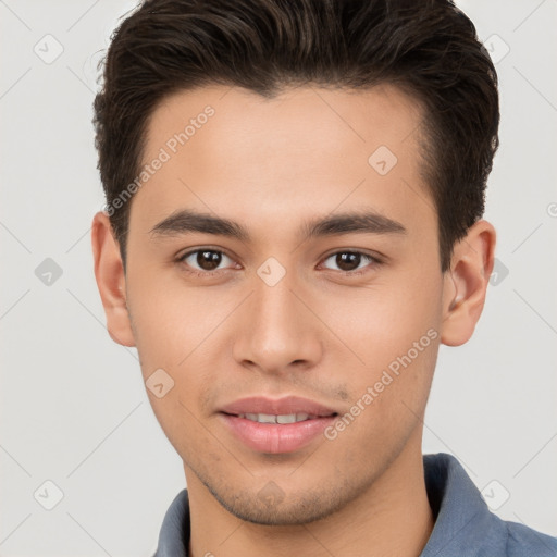 Joyful white young-adult male with short  brown hair and brown eyes