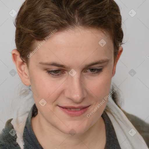 Joyful white young-adult female with medium  brown hair and blue eyes