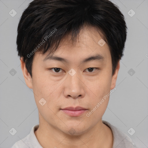 Neutral asian young-adult male with short  brown hair and brown eyes