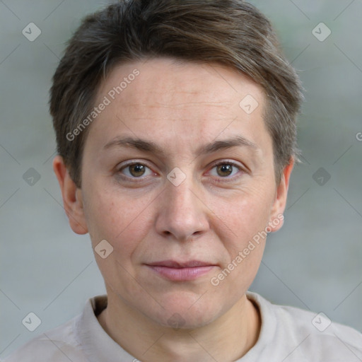 Joyful white adult female with short  brown hair and grey eyes