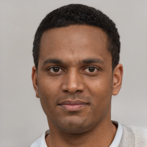 Neutral black young-adult male with short  black hair and brown eyes