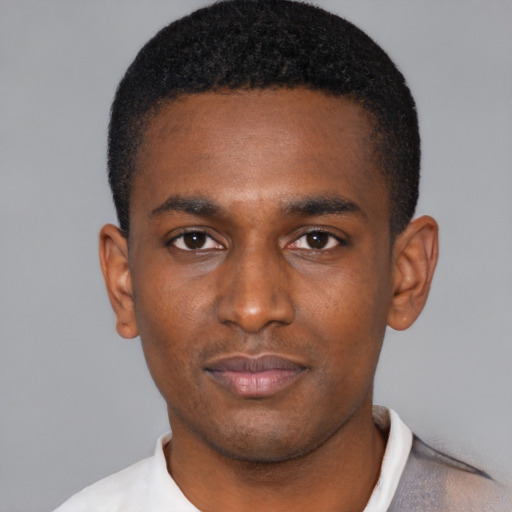 Neutral black young-adult male with short  black hair and brown eyes