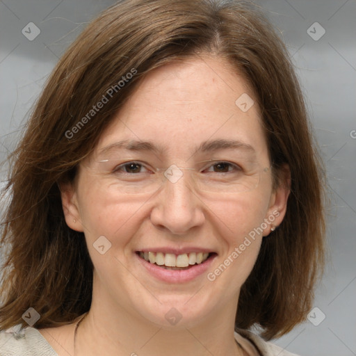 Joyful white adult female with medium  brown hair and brown eyes