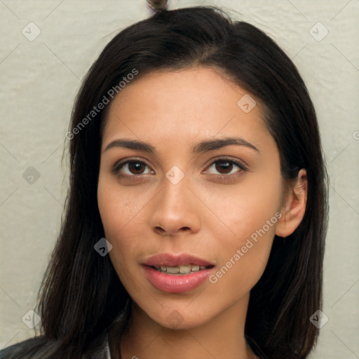 Joyful asian young-adult female with long  brown hair and brown eyes