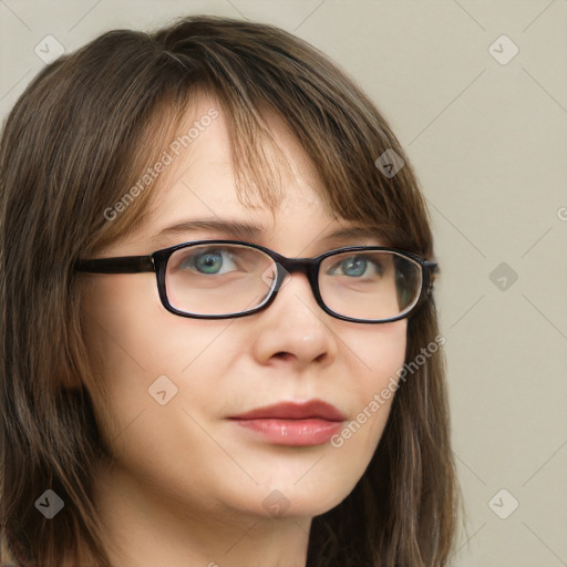 Neutral white young-adult female with long  brown hair and green eyes