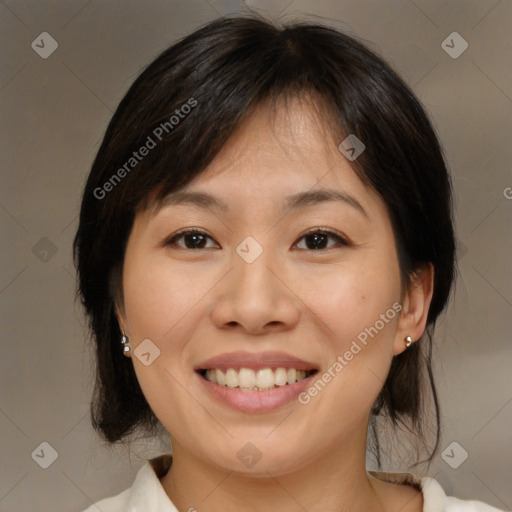 Joyful white young-adult female with medium  brown hair and brown eyes