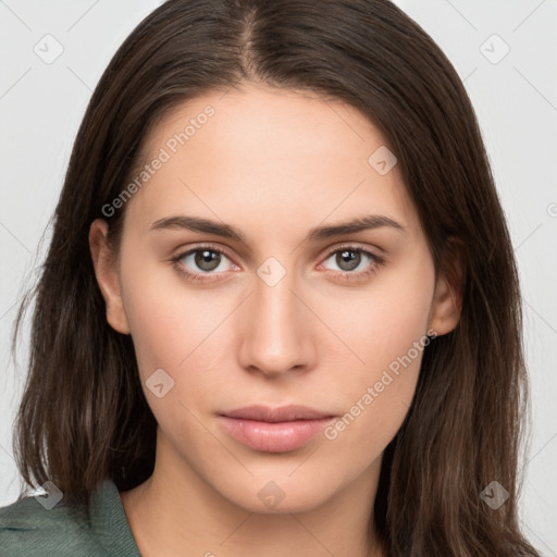 Neutral white young-adult female with long  brown hair and brown eyes